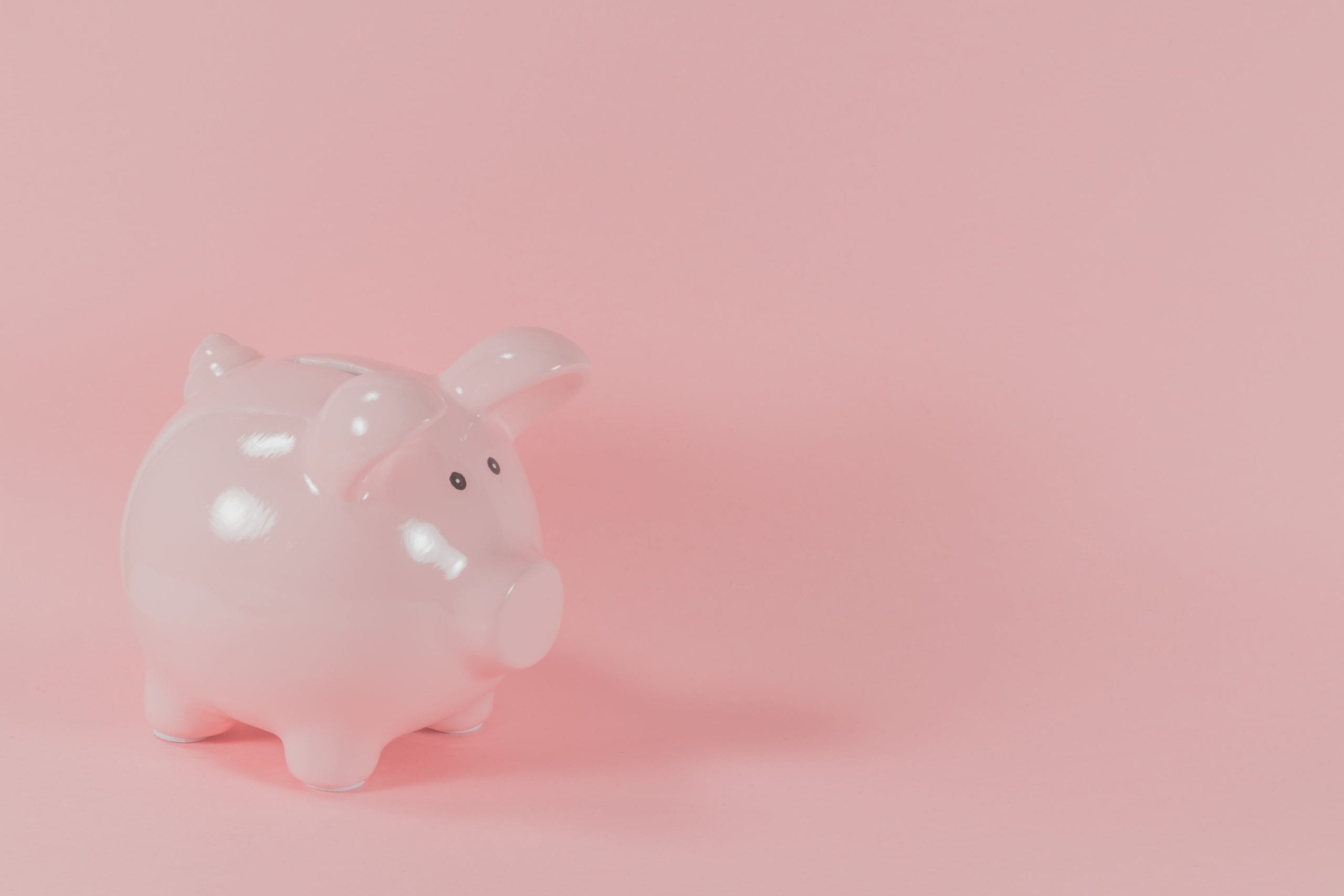 piggy bank with a pink background